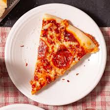 Cheese pizza on a white plate
