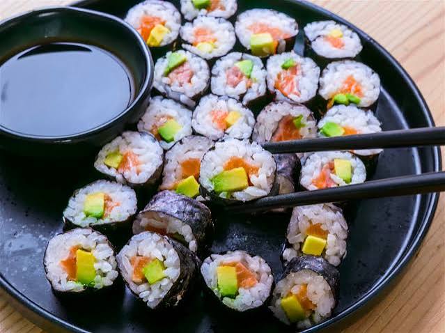 Fresh sushi rolls with soy sauce